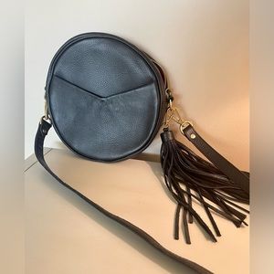 TAH circle leather crossbody bag. Black. Excellent condition.
